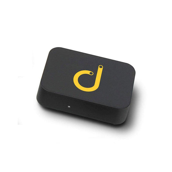 Sleek black Domotz network monitoring device with a bright yellow "d" logo and small white indicator light.